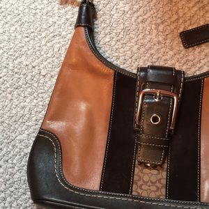 Small coach handbag.